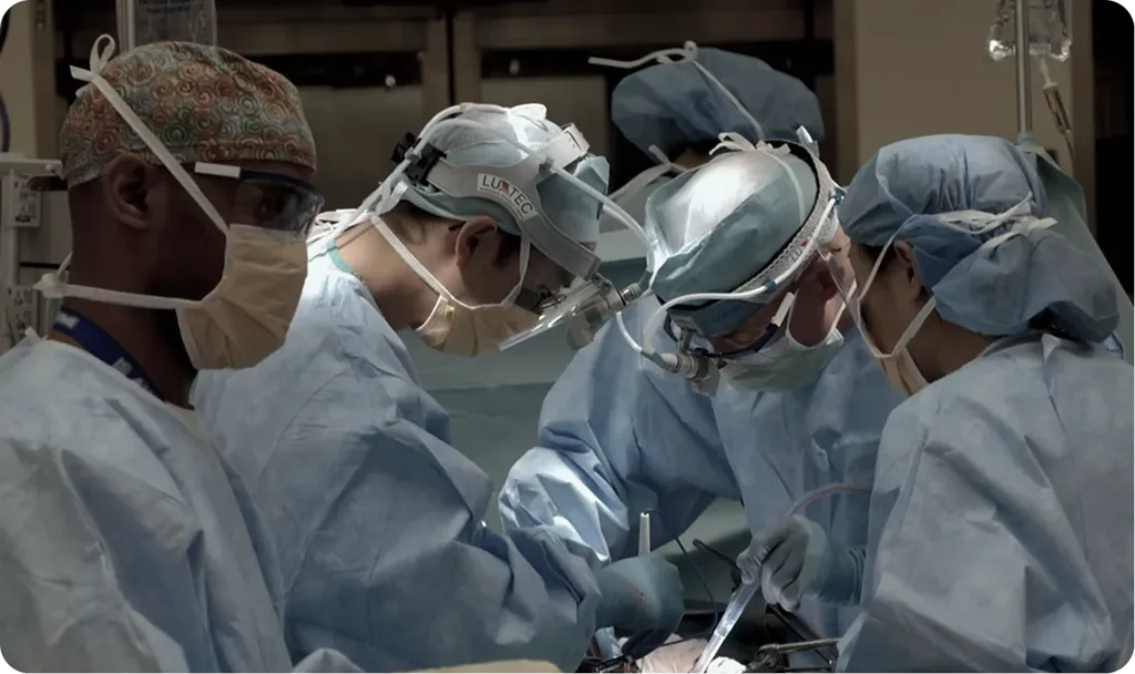 Dr. Larry Shannon and surgical team performing a complex neurosurgical procedure in the operating room.